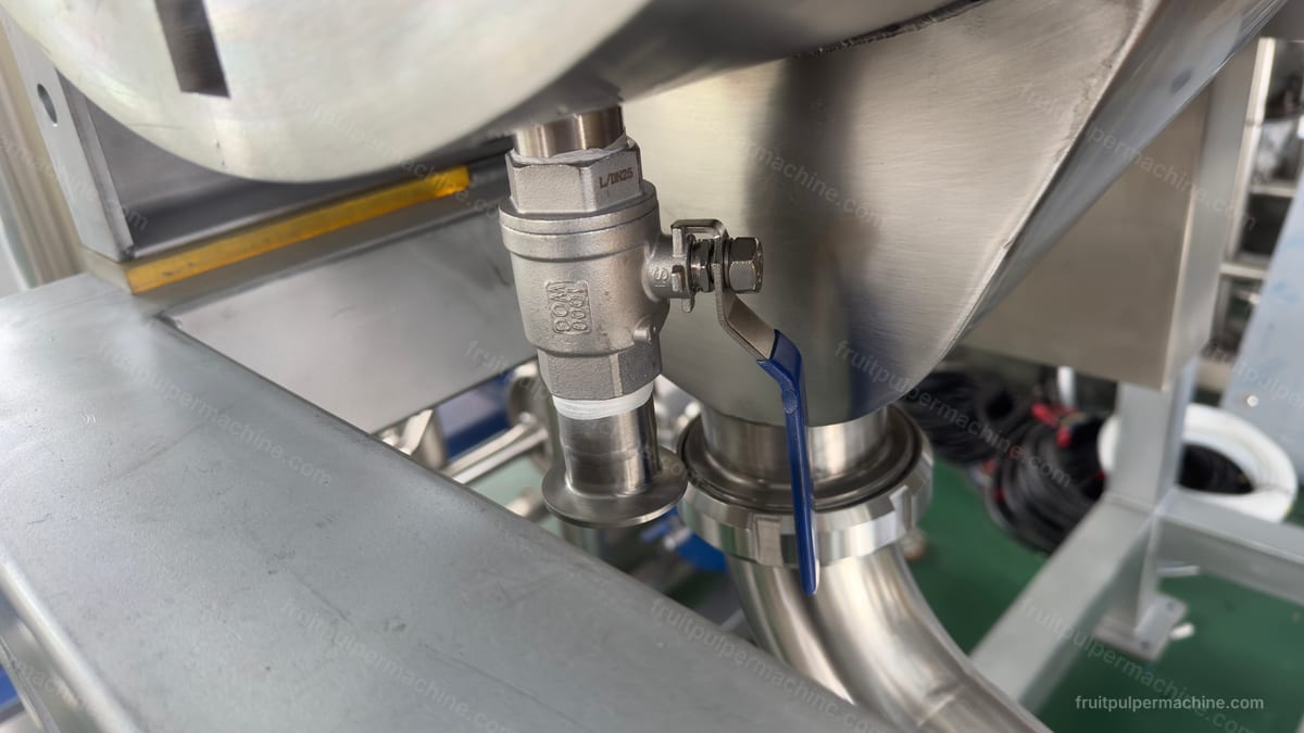 Stainless fruit pulper feed-hopper connection and shutoff interface above the working chamber