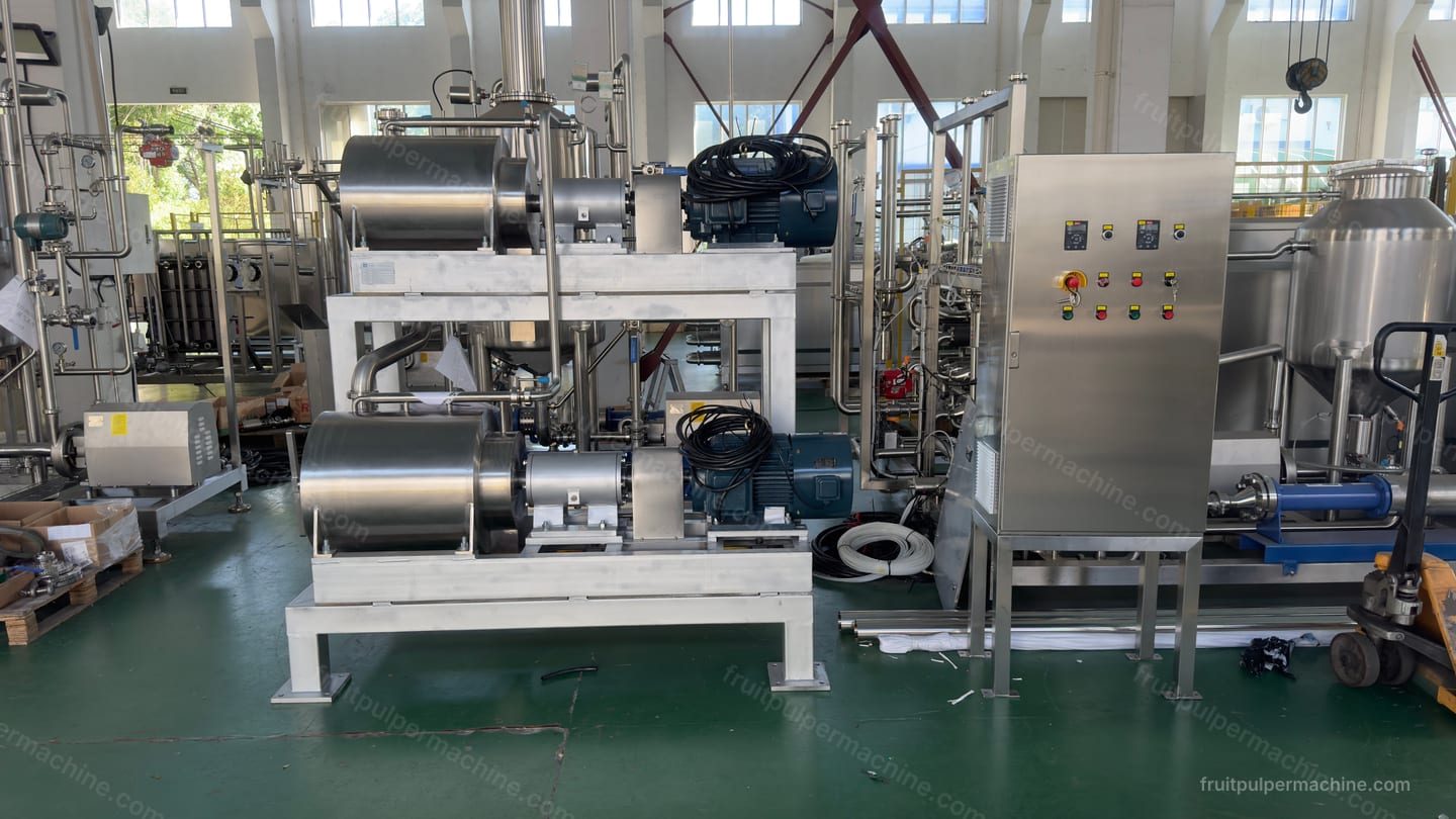 Fruit pulper frame, drive units, control cabinet, and surrounding service clearance