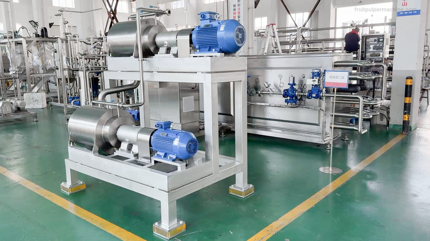 Complete stainless-steel fruit pulper machine with feed hopper, drive, frame, and discharge outlets